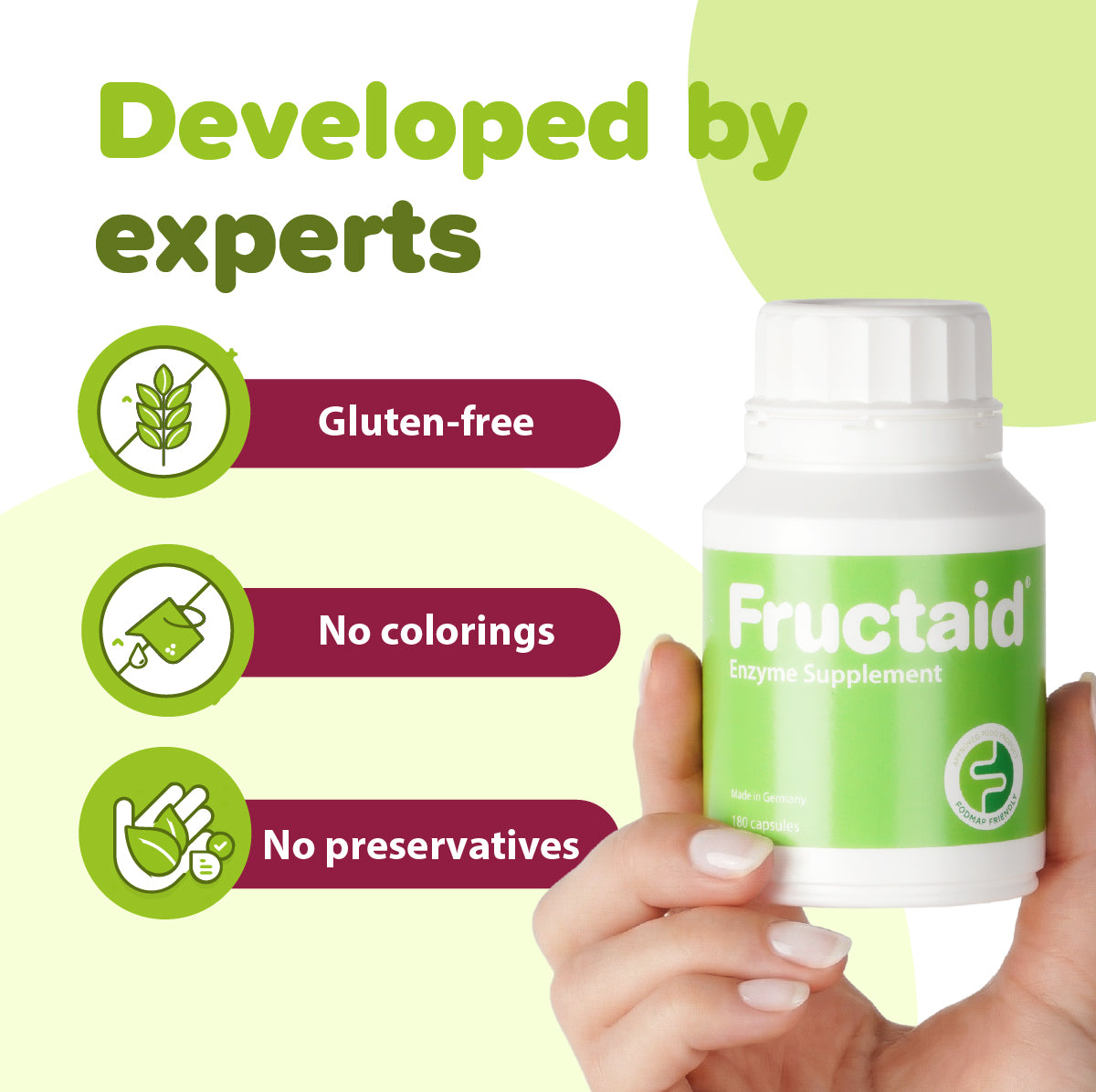 Fructaid supplement bottle held by a hand with green background and text about product features. 